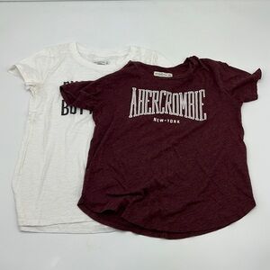 White and Burgundy T-Shirts.